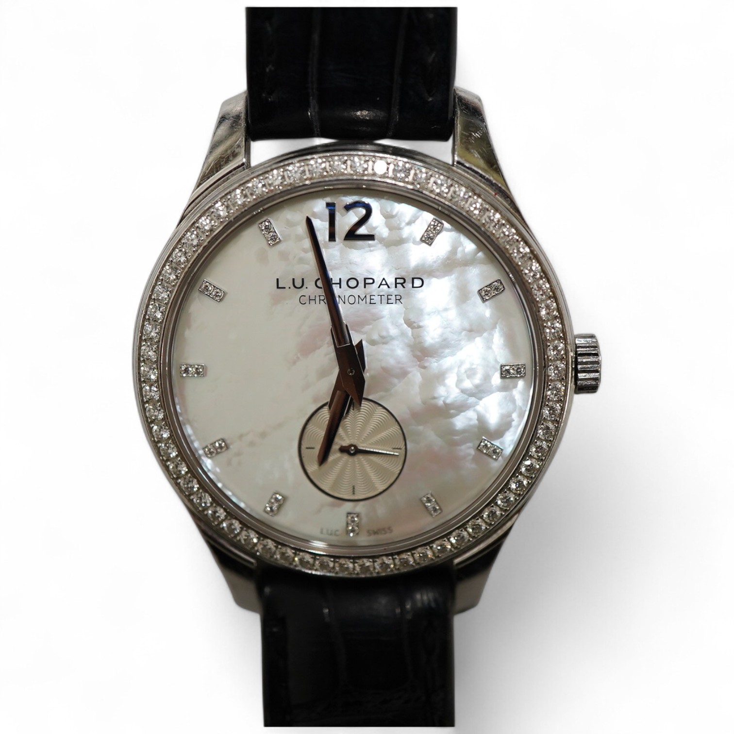 A gentleman's recent 18k white metal L.U. Chopard automatic chronometer wrist watch, with mother of pearl dial, diamond dot markers and subsidiary seconds, the bezel set with small brilliants, case diameter 35mm, movemen